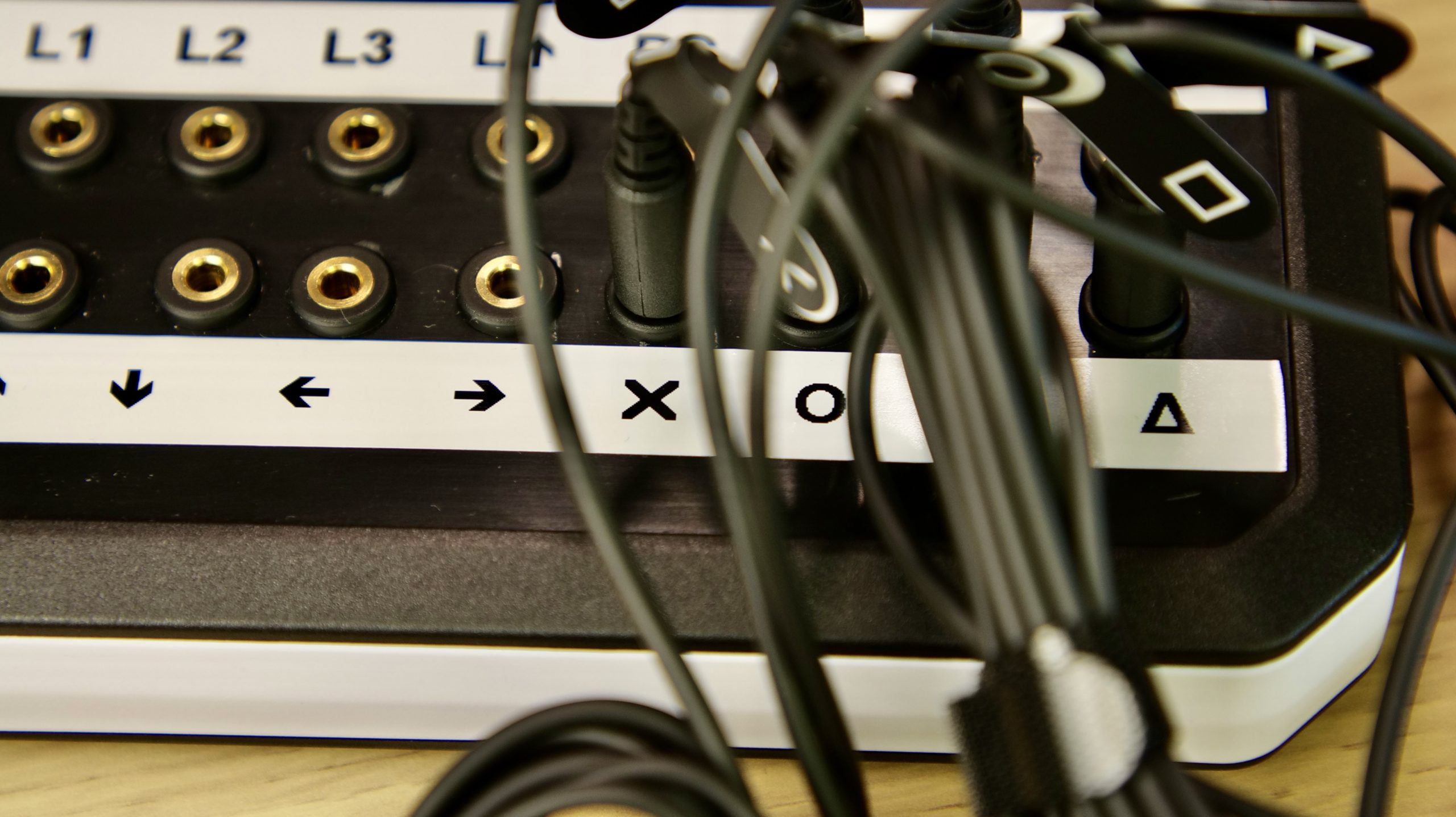 Close up photo showing the switch ports on top of the interface with some of them with a switch connected.
