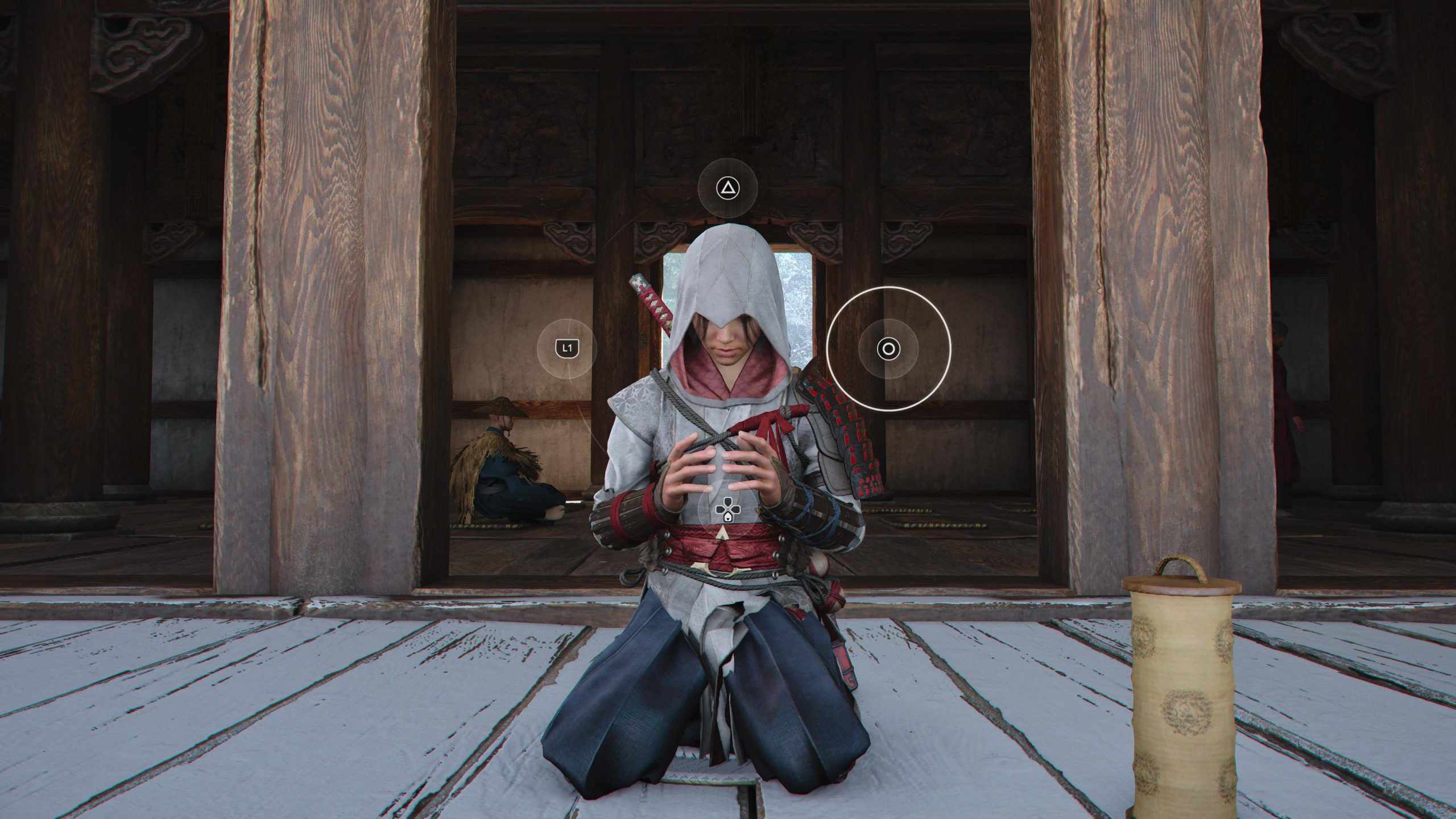Screenshot of Naoe doing a quick time event with 3 button prompts onscreen.