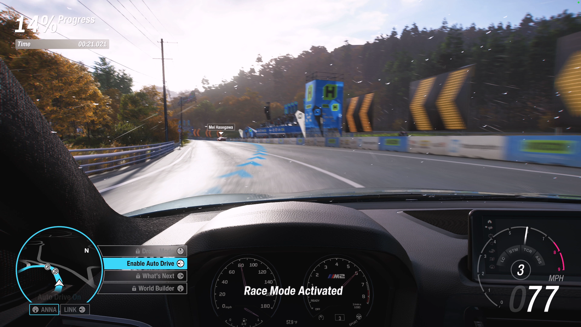 Screenshot showing a first person viewpoint in a vehicle taking a corner on a track. Onscreen is the message 'Race Mode Activated' and the HUD has 'Enable Auto Drive' shown, having just been activated.
